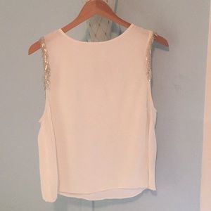 White top with beaded fringe